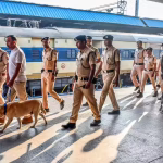 RPF cop kneels on youth’s neck, probe ordered as clip goes viral | India News – The Times of India
